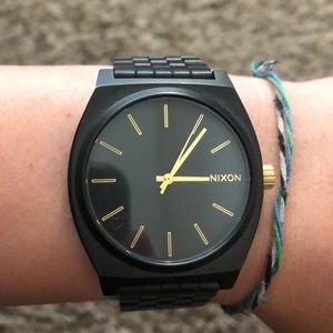 Black and Gold Nixon Watch